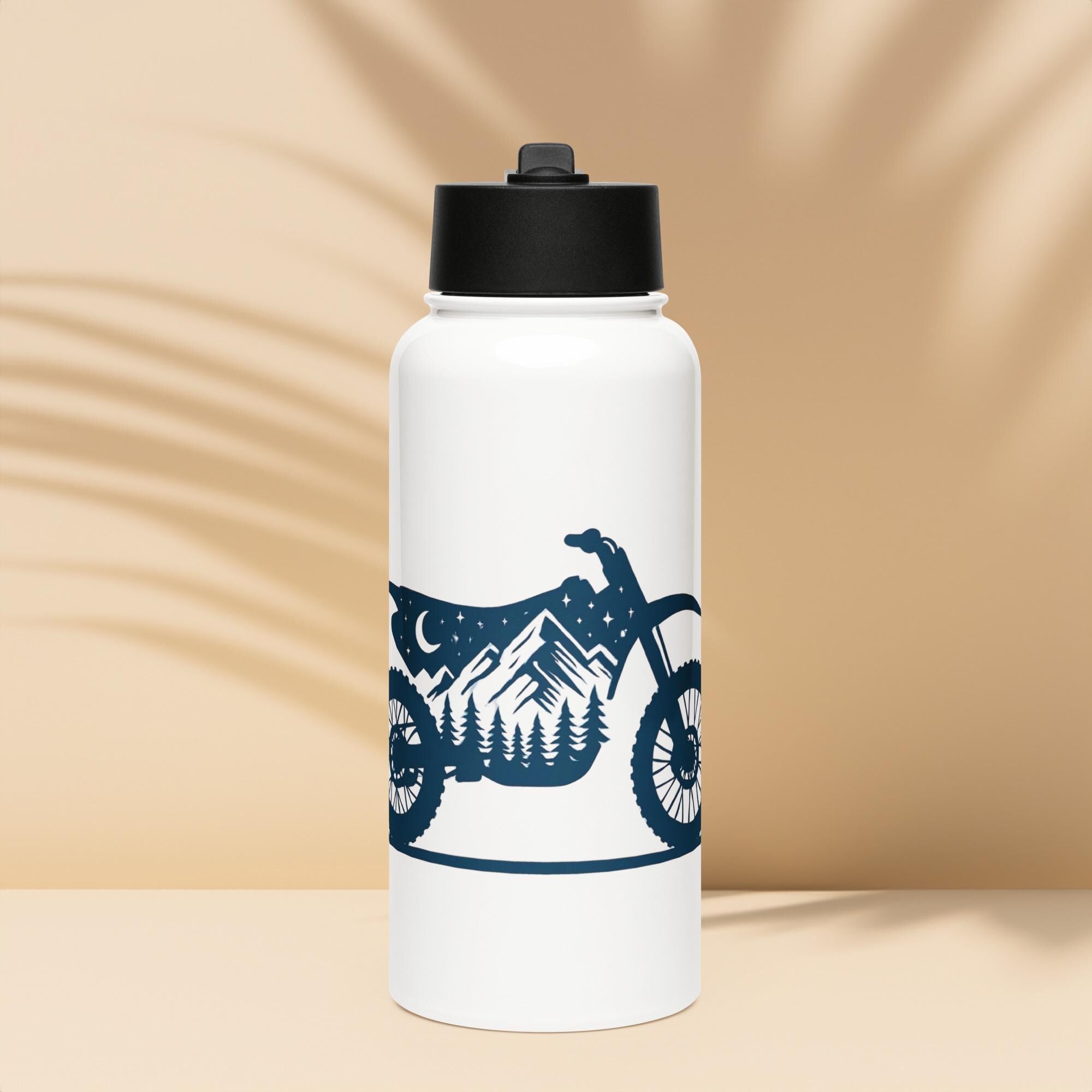 Stainless steel water bottle with a straw lid